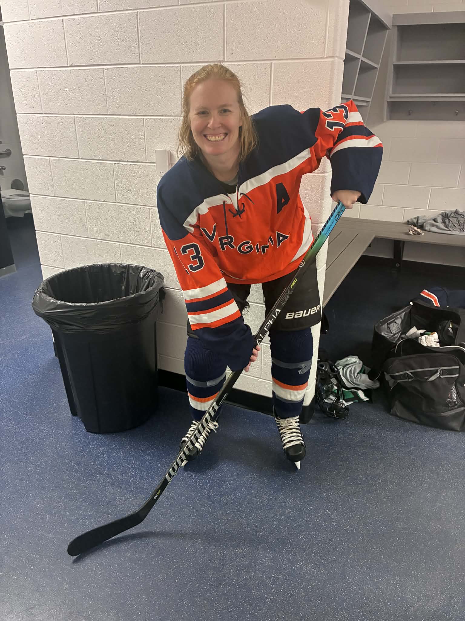 Student playing hockey